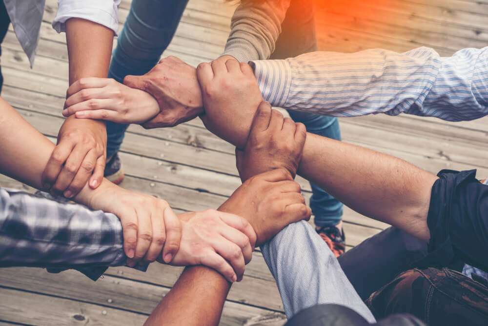 hands holding in a circle
